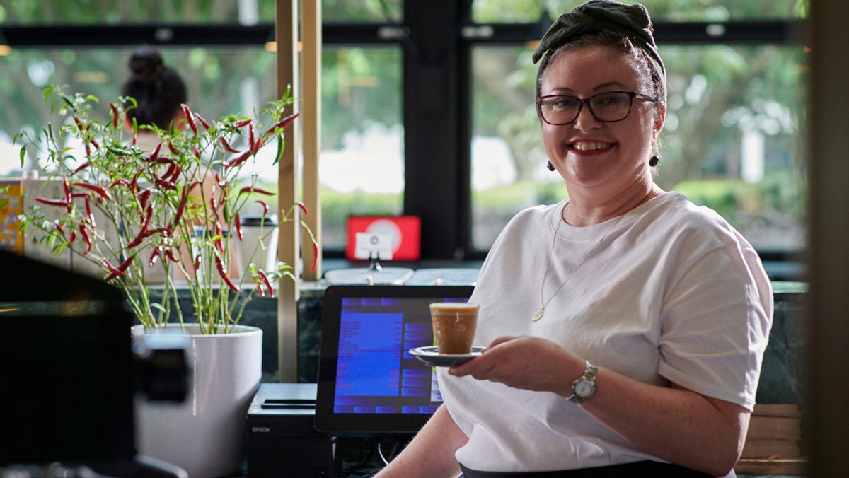 self-employed coffee shop owner