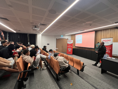 Mario Rehayem doing a talk to professional football athletes