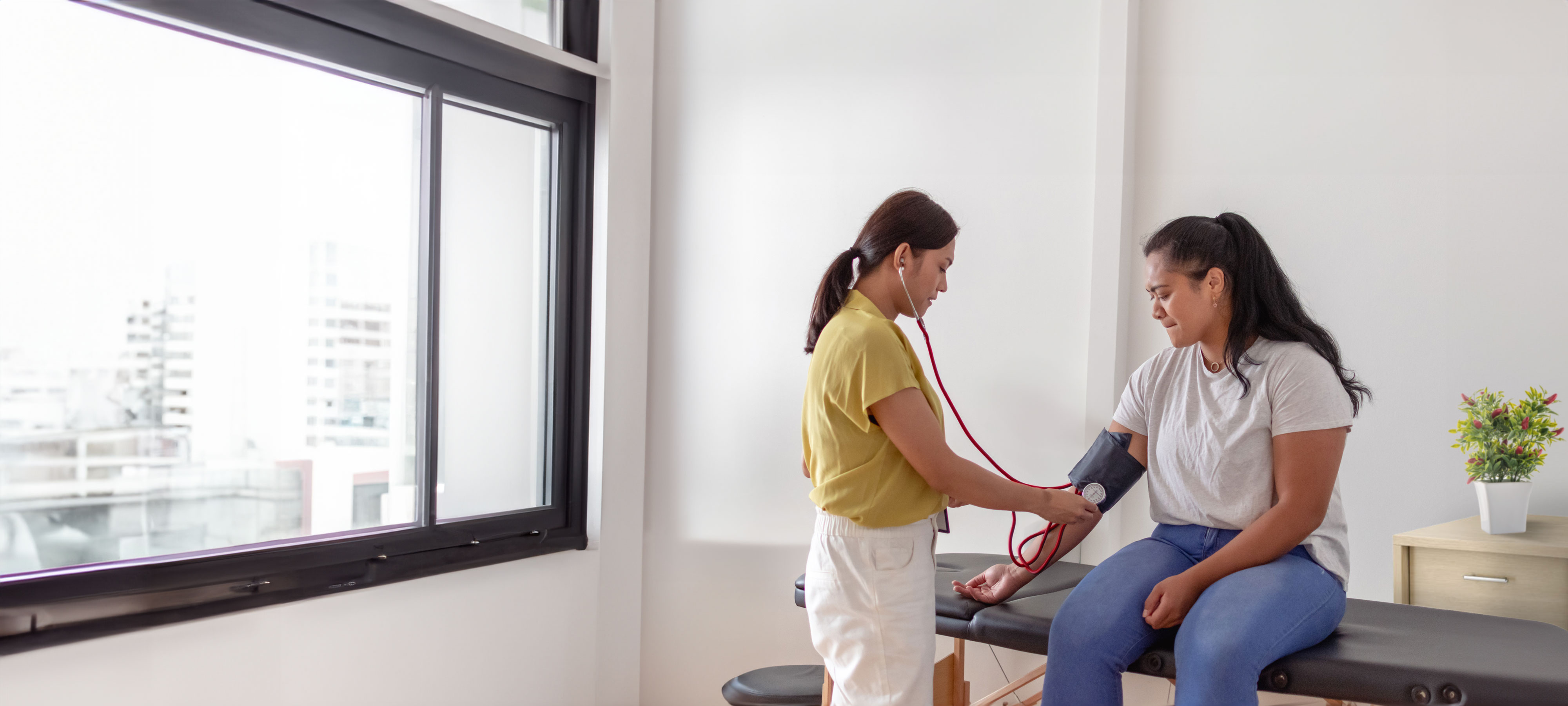 Nurse taking a patient's blood pressure