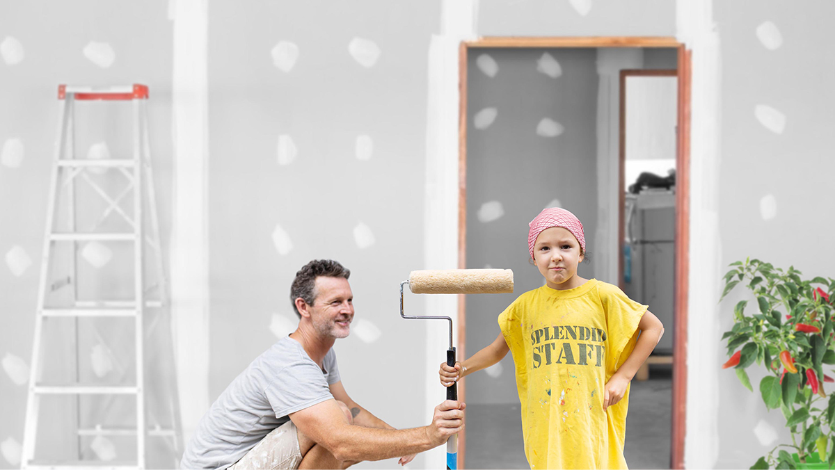 Dad and kid painting home