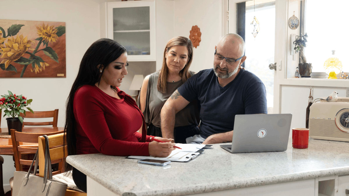 mortgage broker discussing loan terms with customer