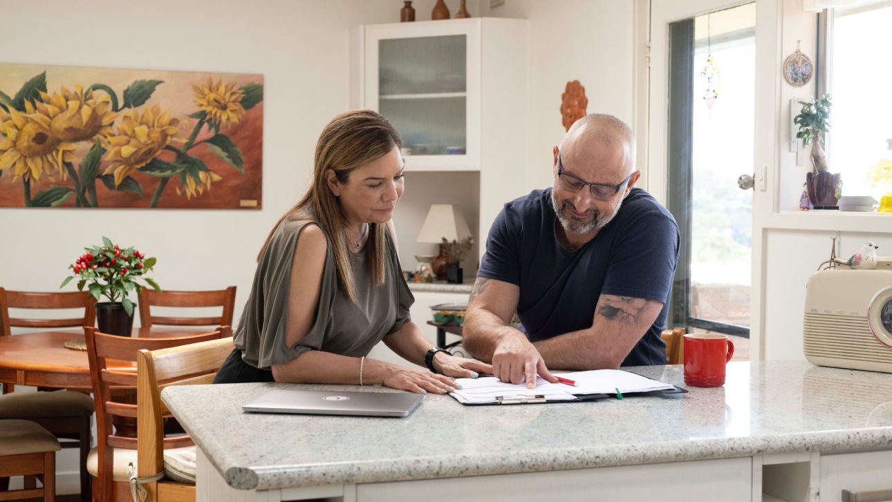 Couple discuss possibility of selling their home