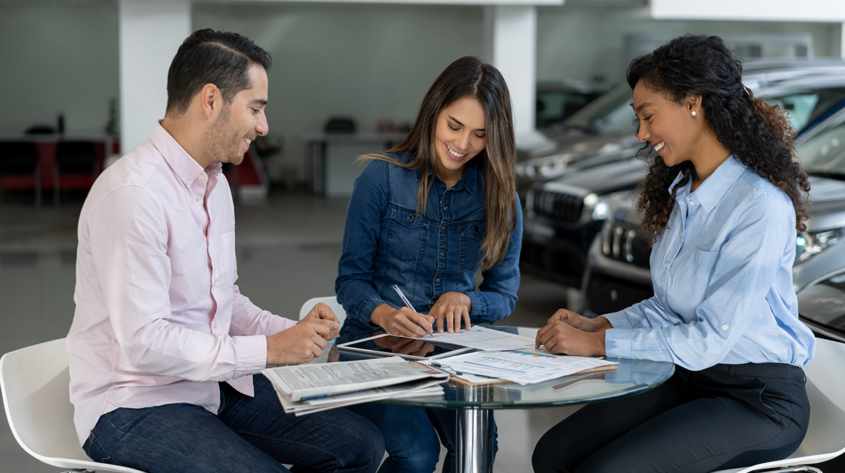 buyer looking at the payment scheme of his car loan