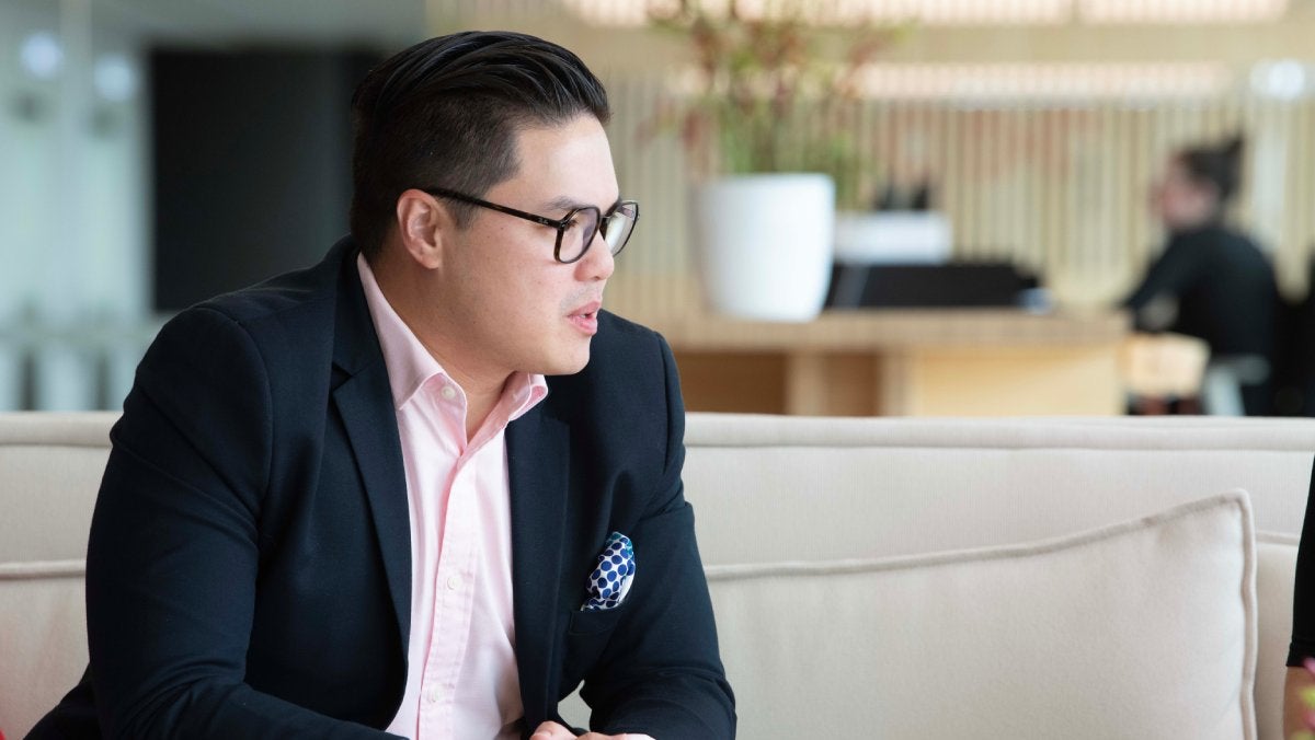 man checking for available loan options