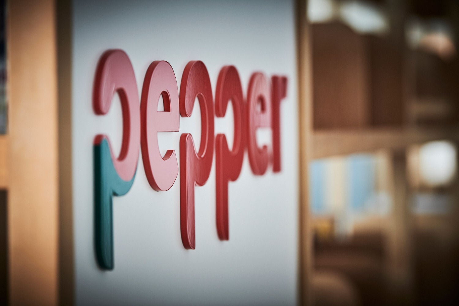 Pepper Money logo in office